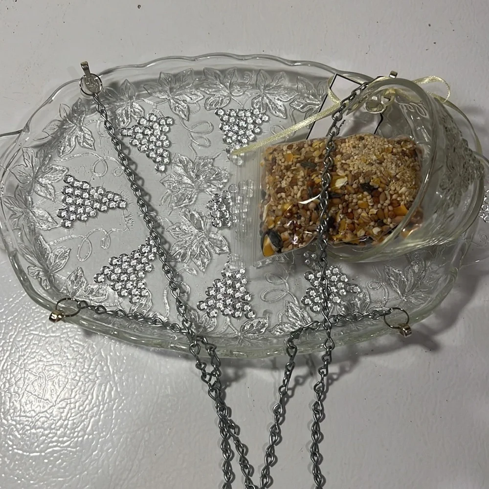 Snack plate and punch cup bird feeder made of vintage glassware